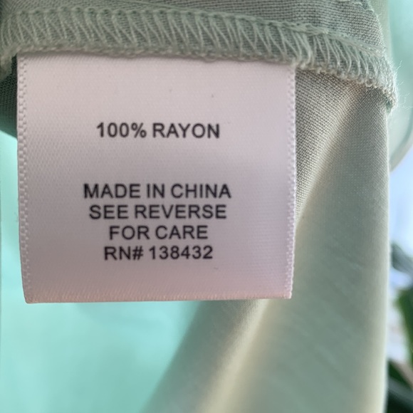 ModCloth mint and navy sleeveless vintage - look blouse. - Picture 3 of 4